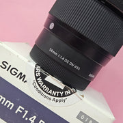 a) Sigma 56mm f/1.4 DC DN Lens | APS-C Portrait Prime | Fast f/1.4 (Code: AB43)