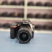 b) Nikon D3500 + 18-55mm Kit Lens | Beginner Friendly DSLR | Lightweight & Powerful | SK251