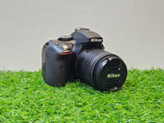a) Nikon D5300 DSLR Camera with 18-55mm f/3.5-5.6 VR Lens | 24.2MP APS-C Sensor | Full HD Video | WiFi & GPS | Vari-Angle Screen | Beginner Friendly Photography Camera 📸🔥