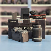 a) Canon EOS R10 Mirrorless Camera with RF-S 18-150mm IS STM Lens | 24.2MP APS-C | 4K Video | Fast Hybrid Autofocus | Compact All-Rounder | SK1046