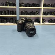 a) Nikon D3400 with 18-55mm VR Lens | 24.2MP Entry-Level DSLR Camera | Compact & Beginner Friendly | SK147