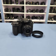 b) Panasonic Lumix G85 Mirrorless Camera Body – 4K Video & 5-Axis Stabilization | SK1023