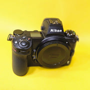 a) Nikon Z7 II Mirrorless Camera Body | 45.7MP Full-Frame | 4K Video (Code: AB42)