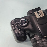 a) Canon EOS 550D DSLR Camera with 18-55mm IS II Lens | 18MP APS-C | Full HD Video | Beginner Friendly DSLR | Lightweight Camera | (Code AB05)