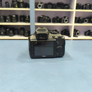a) Nikon D3400 with 18-55mm VR Lens | 24.2MP Entry-Level DSLR Camera | Compact & Beginner Friendly | SK147