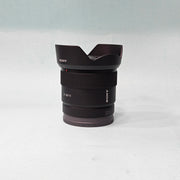 a) Sony E 11mm f/1.8 Ultra Wide-Angle Prime Lens | APS-C E-Mount | Fast f/1.8 Aperture | Lightweight Vlogging & Landscape Lens | SK1058