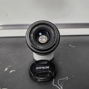 a) Nikon AF-S DX NIKKOR 35mm f/1.8G Lens | Fast Standard Prime Lens for Nikon DX DSLR Cameras | Portrait, Street & Low-Light Photography | SK176