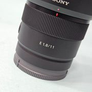 a) Sony E 11mm f/1.8 Ultra Wide-Angle Prime Lens | APS-C E-Mount | Fast f/1.8 Aperture | Lightweight Vlogging & Landscape Lens | SK1058