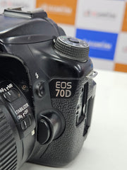 a) Canon EOS 70D DSLR Camera with 18-135mm IS Lens | 20.2MP APS-C Sensor | Dual Pixel Autofocus | Full HD Video | Versatile Zoom Kit | SK1053