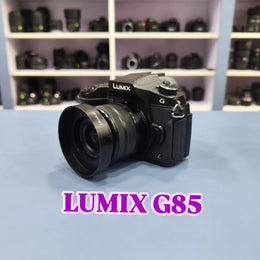 b) Panasonic Lumix G85 Mirrorless Camera Body – 4K Video & 5-Axis Stabilization | SK1023