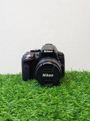 a) Nikon D5300 DSLR Camera with 18-55mm f/3.5-5.6 VR Lens | 24.2MP APS-C Sensor | Full HD Video | WiFi & GPS | Vari-Angle Screen | Beginner Friendly Photography Camera 📸🔥
