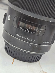a) Sigma 50mm f/1.4 DG HSM Art Lens (Canon EF Mount) | Ultra-Sharp Prime | Beautiful Bokeh | Low-Light Performer | SK1050