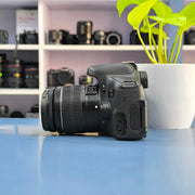 a) Canon EOS 750D DSLR Camera with 18-55mm III Lens | 18MP | Full HD Video | Flip Screen | Beginner Friendly | SK1034