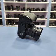 b) Panasonic Lumix G85 Mirrorless Camera Body – 4K Video & 5-Axis Stabilization | SK1023