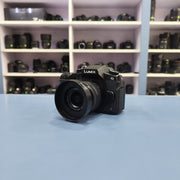 b) Panasonic Lumix G85 Mirrorless Camera Body – 4K Video & 5-Axis Stabilization | SK1023