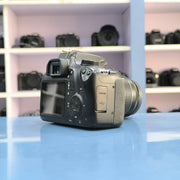 b) Canon EOS 3000D DSLR Camera with 18-55mm IS II Kit Lens | Beginner Friendly DSLR SK1028