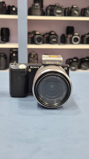c) Sony NEX-5 with 18-55mm OSS Lens – Compact Mirrorless Camera