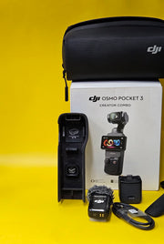 a) DJI Osmo Pocket 3 Creator Combo | 1-inch CMOS Sensor | 4K/120fps | 3-Axis Gimbal | Vlogging Camera Kit