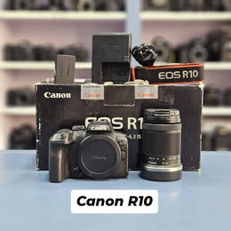 a) Canon EOS R10 Mirrorless Camera with RF-S 18-150mm IS STM Lens | 24.2MP APS-C | 4K Video | Fast Hybrid Autofocus | Compact All-Rounder | SK1046