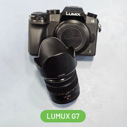 a) Panasonic Lumix G7 Mirrorless Camera with 14-42mm Lens | 16MP Micro Four Thirds Sensor | 4K Video Recording | Fast Autofocus | Compact Hybrid Camera | SK1054