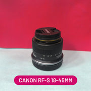 a) Canon RF-S 18-45mm f/4.5-6.3 IS STM Lens | Compact Standard Zoom Lens for Canon RF Mount Mirrorless Cameras | Everyday Photography, Travel & Vlogging Lens | SK180