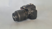 c) Nikon D3000 with 18-55mm Lens – 10.2MP DSLR Camera | Beginner Friendly | Sharp Image Quality