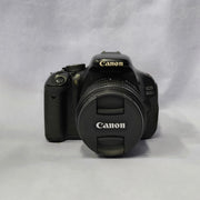 a) Canon EOS 600D DSLR Camera with 18-55mm Lens | 18MP | Vari-Angle Display | Perfect for Beginners & Creators SK1038