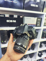 b) Canon EOS 700D DSLR Camera with 18-55mm IS II Lens | Full HD Video | Touchscreen Display | SK1009