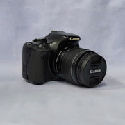 a) Canon EOS 600D DSLR Camera with 18-55mm Lens | 18MP | Vari-Angle Display | Perfect for Beginners & Creators SK1038