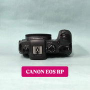 b) Canon EOS RP Full-Frame Mirrorless Camera Body | 26MP | 4K Video | Dual Pixel AF | Compact & Lightweight | SK1021