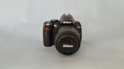 c) Nikon D3000 with 18-55mm Lens – 10.2MP DSLR Camera | Beginner Friendly | Sharp Image Quality