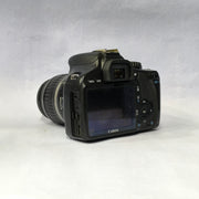 a) Canon EOS Rebel T2i DSLR Camera with 18-55mm Lens | 18MP | Full HD Video | Perfect for Beginners & Creators SK1039