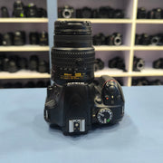 a) Nikon D3400 with 18-55mm VR Lens | 24.2MP Entry-Level DSLR Camera | Compact & Beginner Friendly | SK147
