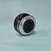 c) Sony A6100 Mirrorless Camera with Kit Lens – Excellent Condition