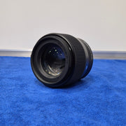 c) Sigma 56mm 1.4 APS-C Portrait Lens – Excellent Low Light Performance sk98