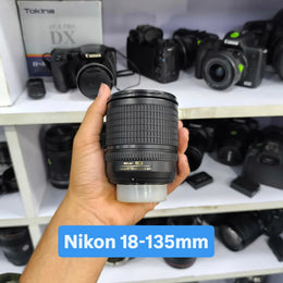 a) Nikon AF-S DX NIKKOR 18-135mm f/3.5-5.6G ED Lens | Versatile Zoom Lens for Nikon DX DSLR Cameras | Travel, Portrait & Everyday Photography | SK172