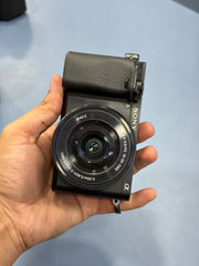 c) Sony alpha a6400 with 16-50mm lens full kit.