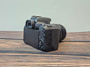 a) Canon EOS 200D DSLR Camera with 18-55mm STM Lens | 24.2MP APS-C | Dual Pixel AF | Full HD Video | WiFi & Bluetooth | Lightweight DSLR