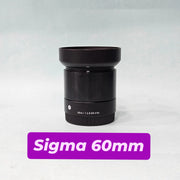 a) Sigma 60mm f/2.8 DN Art Lens | Prime Lens | Sharp Portrait & Product Lens | Compact Mirrorless Lens | AB10