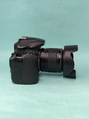 b) Nikon D3400 DSLR + AF-P 18-55mm VR Lens Kit | SK1012