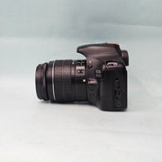 a) Canon EOS 550D DSLR Camera with 18-55mm IS II Lens | 18MP APS-C | Full HD Video | Beginner Friendly DSLR | Lightweight Camera | (Code AB05)