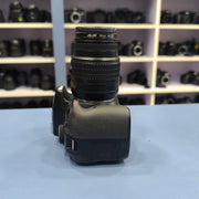 a) Nikon D3400 with 18-55mm VR Lens | 24.2MP Entry-Level DSLR Camera | Compact & Beginner Friendly | SK147
