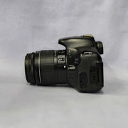 a) Canon EOS 600D DSLR Camera with 18-55mm Lens | 18MP | Vari-Angle Display | Perfect for Beginners & Creators SK1038