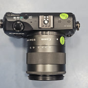 a) Canon EOS M Mirrorless Camera with 18-55mm Lens | Compact APS-C Camera (Code: AB36)