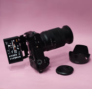 b) Sony A6400 Mirrorless Camera with 18-135mm f/3.5-5.6 OSS Lens | 24.2MP APS-C | 4K Video | Fast AF | SK522