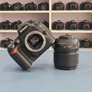 b) Nikon D90 DSLR Camera with 18-105mm VR Lens | 12.3MP | HD Video | Reliable Nikon DX Camera | SK252