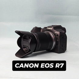 a) Canon EOS R7 Mirrorless Camera with RF-S 18-150mm IS STM Lens | 32.5MP APS-C | 4K 60p Video | Fast Dual Pixel CMOS AF II | High-Speed Hybrid Camera | SK1064