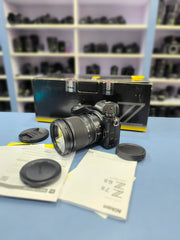 b) Nikon Z6II with 24-70mm lens
Shutter Count 14K SK1010