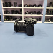 b) Panasonic Lumix G85 Mirrorless Camera Body – 4K Video & 5-Axis Stabilization | SK1023