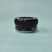 c) Sony A6100 Mirrorless Camera with Kit Lens – Excellent Condition